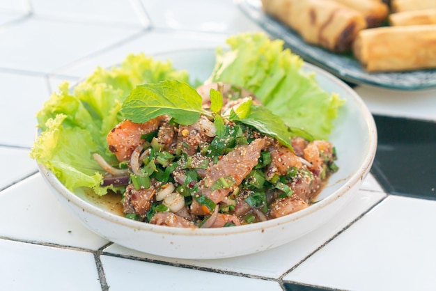 Spicy Salmon Salad or Laab Salmon - Thai food style