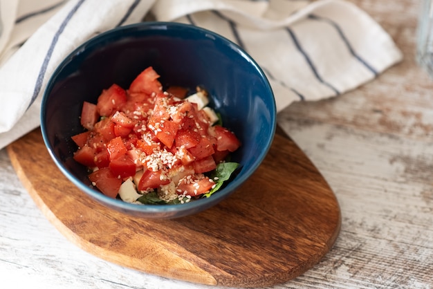 Spinach salad with strawberries and sesame seeds