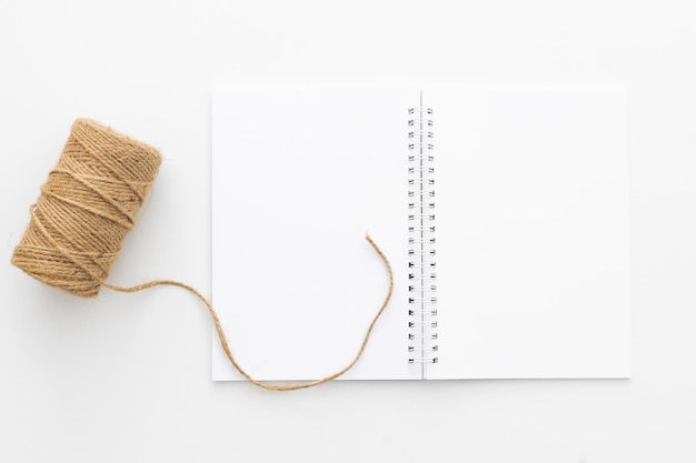 Spiral notebook and pen Notepad with pen and flowers Notebook lilacs on light background