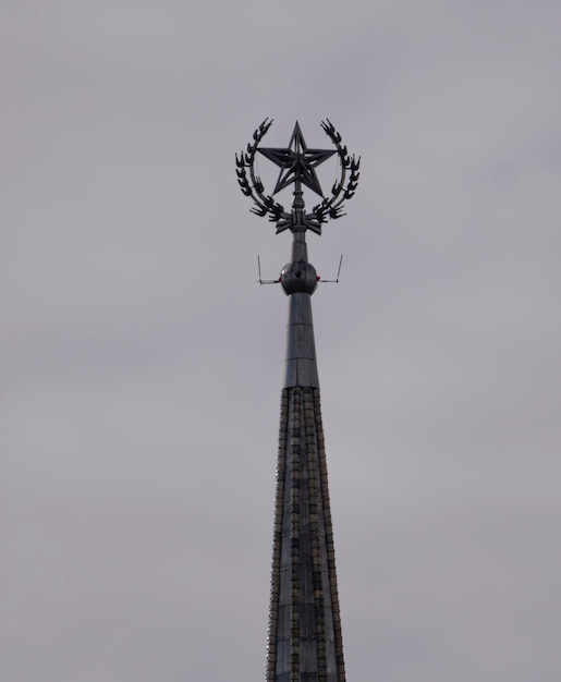 The spire of the hotel Ukraine against the sky in Moscow