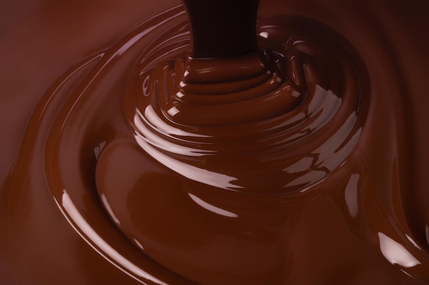 Splash of melted chocolate sweet cocoa dessert dark chocolate background