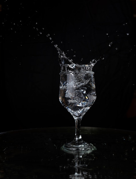 A splash with water and ice on a black background !!!