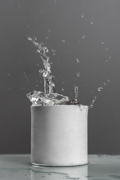 Splashes of water in a plaster pot