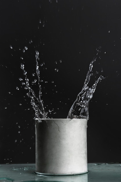 Splashes of water in a plaster pot