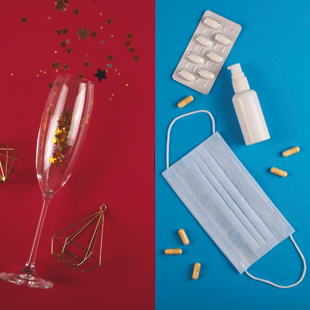 Split Christmas concept during a pandemic. Champagne and holiday or virus and treatment