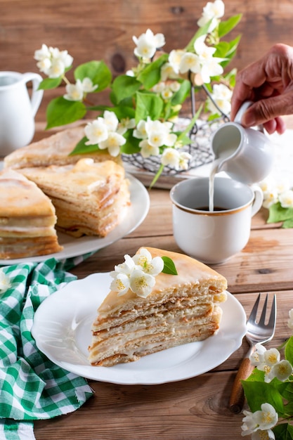 Sponge cake with butter cream on a table