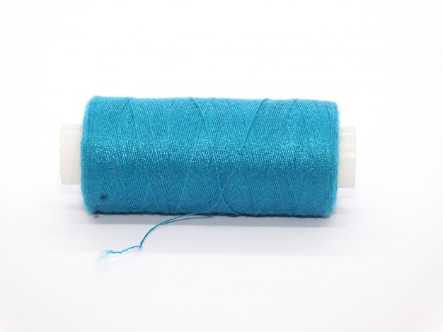 a spool of blue thread