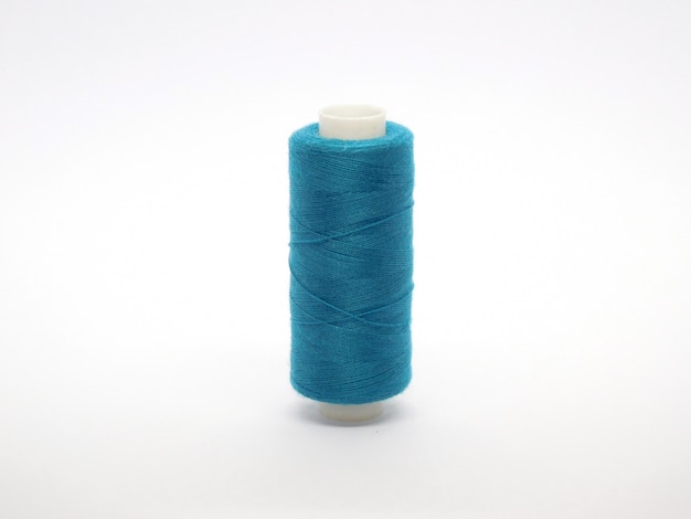 a spool of blue thread