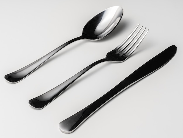 Spoon, fork and knife