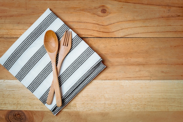 Spoon and fork with napery