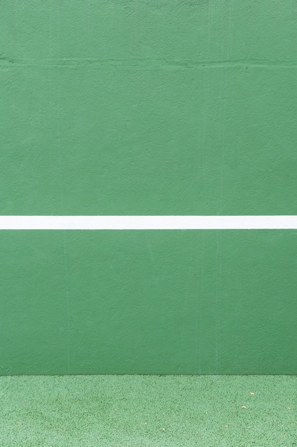 Sport background. Green wall and white line