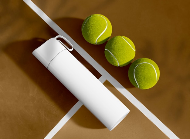 Sport Bottle with Balls on Tennis Court