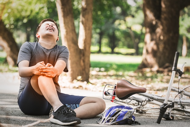 Sport men riding bike injured