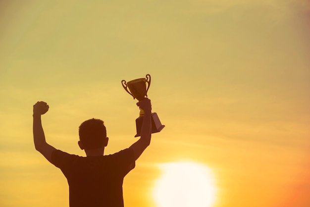 Sport Silhouette trophy best man hands who Winner Award victory trophy for professional challenge.