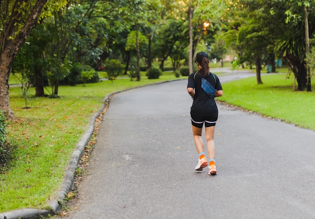 Sport woman exercise jogging at park in