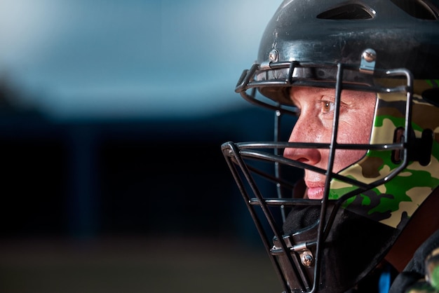 Sports athlete with face helmet fitness professional gear and man training for winter game Competition equipment closeup power player with action wire mask on dark background and strong protection