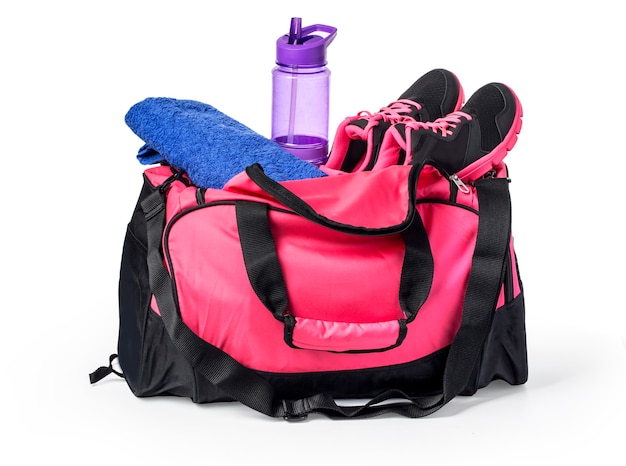 Sports bag with sports equipment isolated on white with clipping path