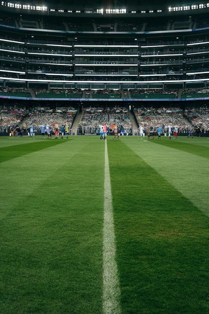 A sports stadium with a white line on the side of the field