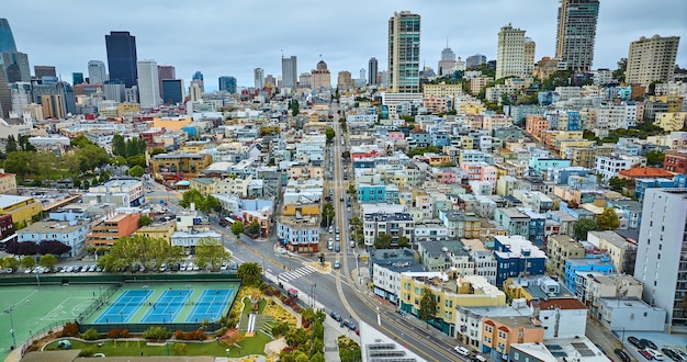 Sports tennis courts in San Francisco CA aerial of city skyscrapers and apartment buildings