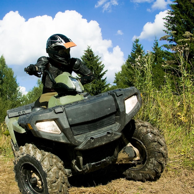 Sportsman riding quad bike