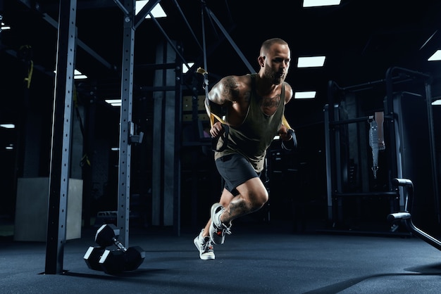 Sportsman running in place in gym