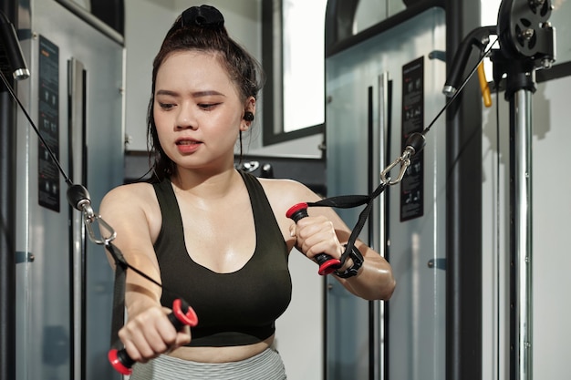 Sportswoman Doing Biceps Exercise