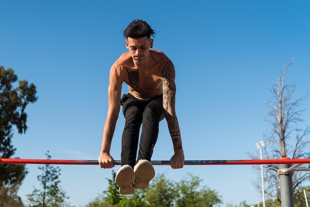 sportswoman doing outdoor gymnastics, athlete, calisthenics