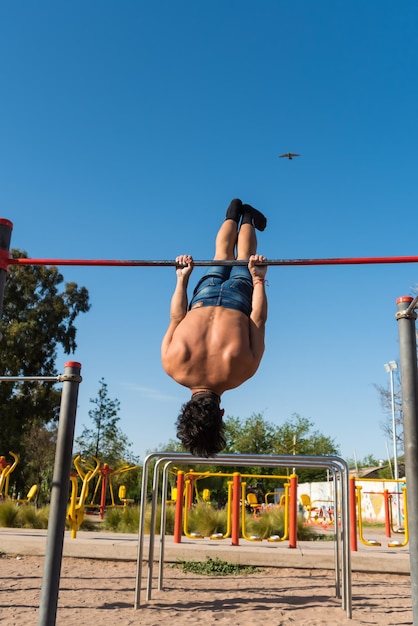 sportswoman doing outdoor gymnastics, athlete, calisthenics