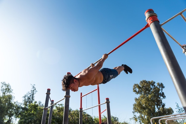 sportswoman doing outdoor gymnastics, athlete, calisthenics