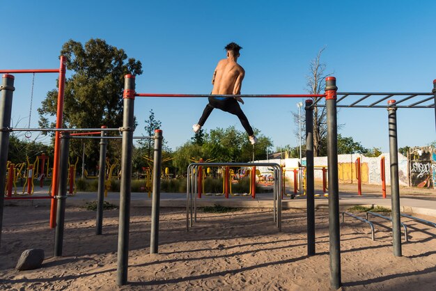 sportswoman doing outdoor gymnastics, athlete, calisthenics