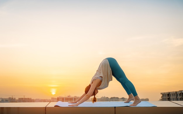 Sportswoman is doing yoga