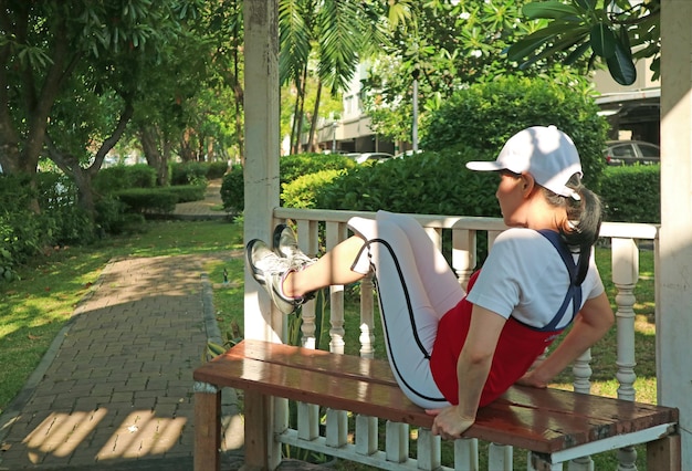 Sporty woman exercising in the park