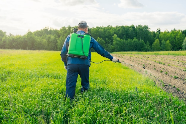 Spraying fields with poison from pests field processing