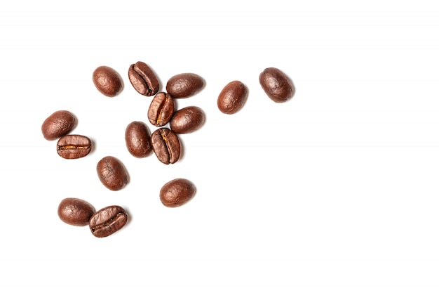 A spread coffee beans isolated on white background and copy space