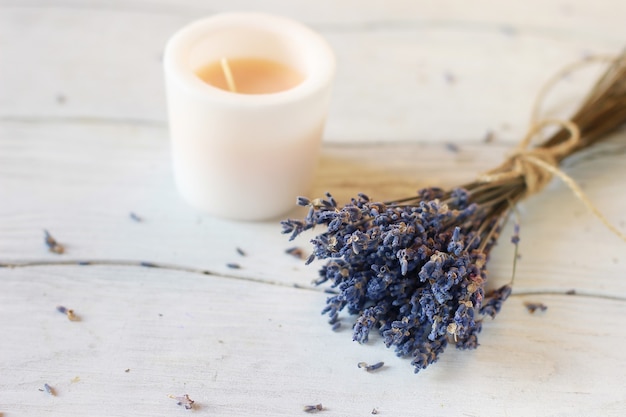 Sprig of dried lavender on a wooden table