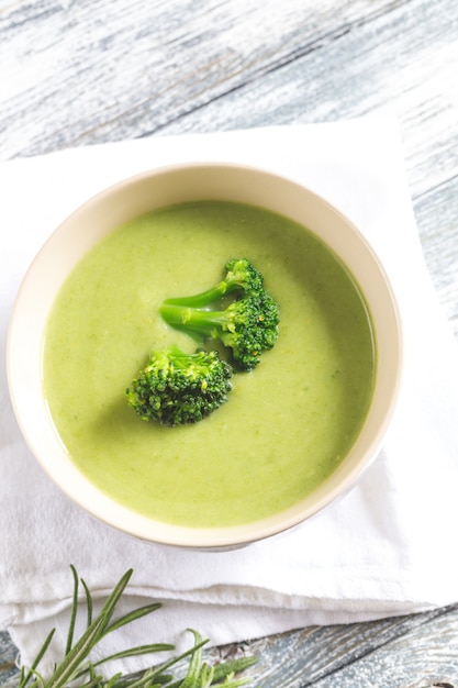 Spring broccoli cream soup with sesame seeds in a bowl