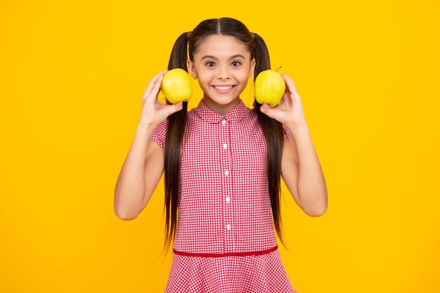 Spring everywhere spring season fruits full of vitamins organic food only natural and healthy happy childhood kid eat apple child with fruit Happy teenager positive emotions of teen girl