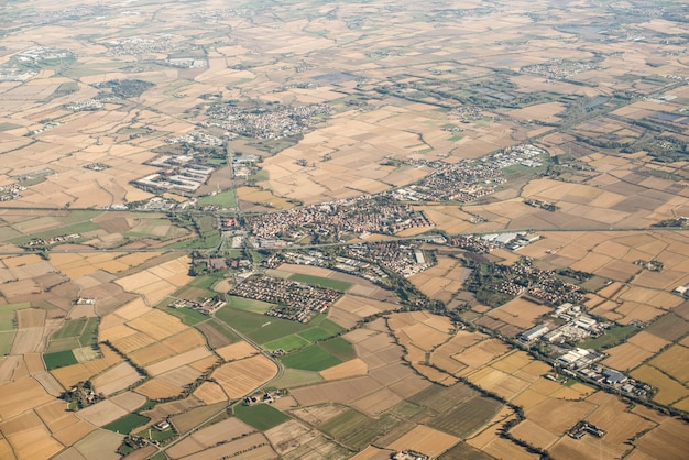 Spring in Italy. Aerial View with Meadows. Small Town.