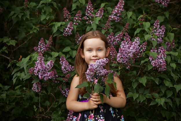 Spring portrait of a child in Park. Funny emotions