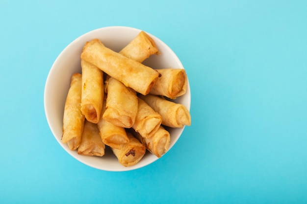 Spring Roll also known as Egg Roll on white dish