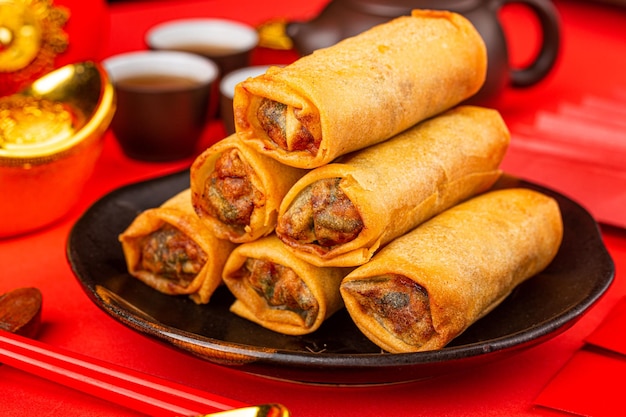 Spring rolls are eaten on Chinese New Year's Day Spring rolls are a Chinese snack