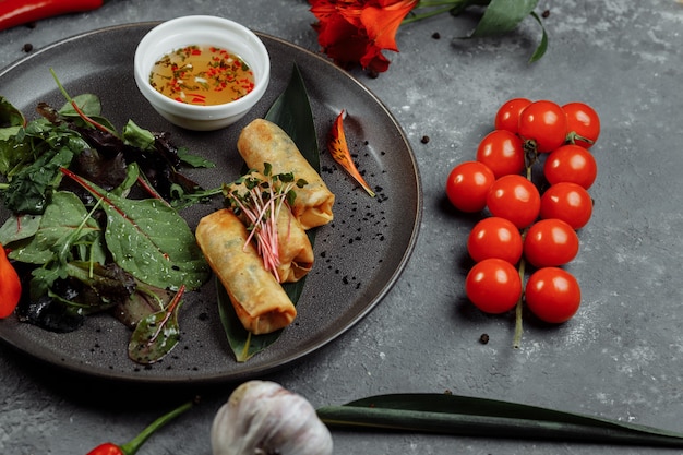 Spring rolls with shrimp with sweet chili sauce. Asian cuisine.