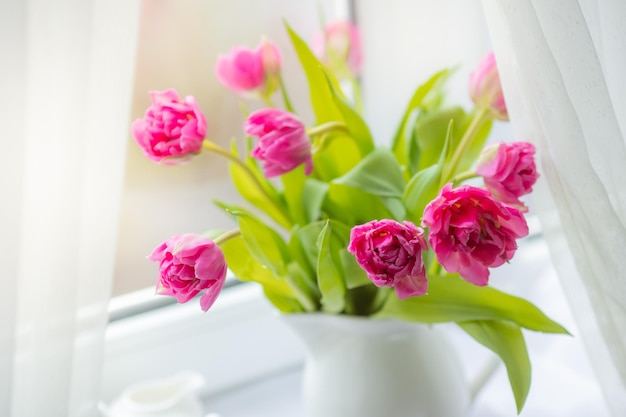 Spring Still life a bouquet of tulips on the window spring greeting card with spring flowers