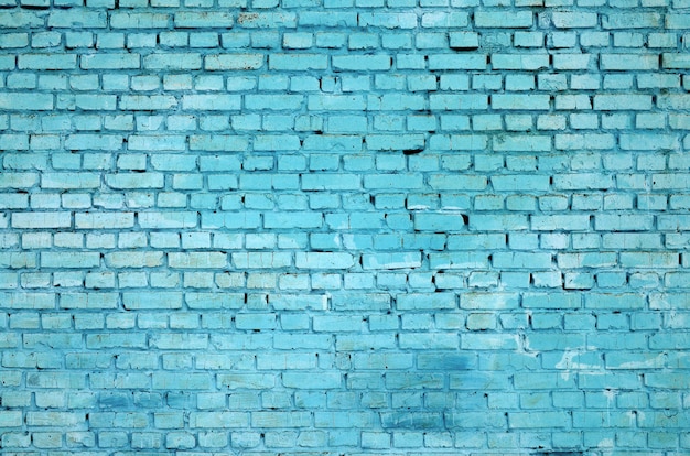 Square brick block wall background and texture. Painted in blue