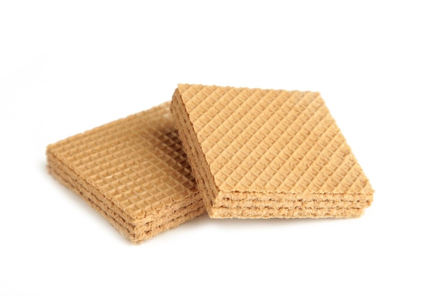 Square chocolate wafer biscuits isolated on white background. Top view.