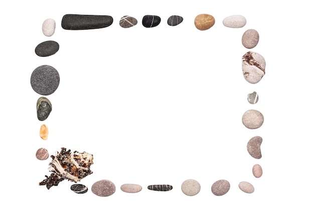 Square frame made of sea stones and shells, isolated on a white background.