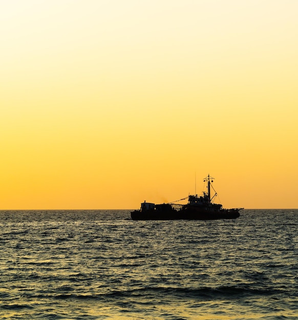 Square orange vivid ocean horizon ship silhouette background backdrop