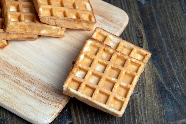 Square sweet soft waffles on the table