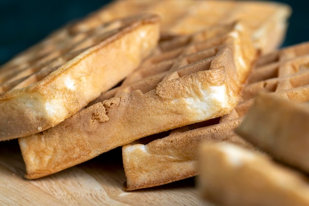 Square sweet soft waffles on the table