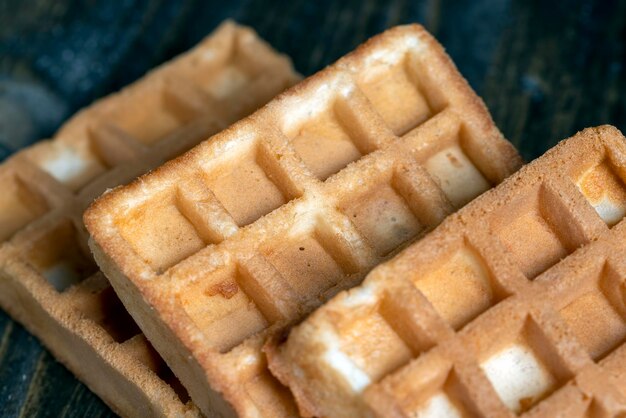 Square sweet soft waffles on the table